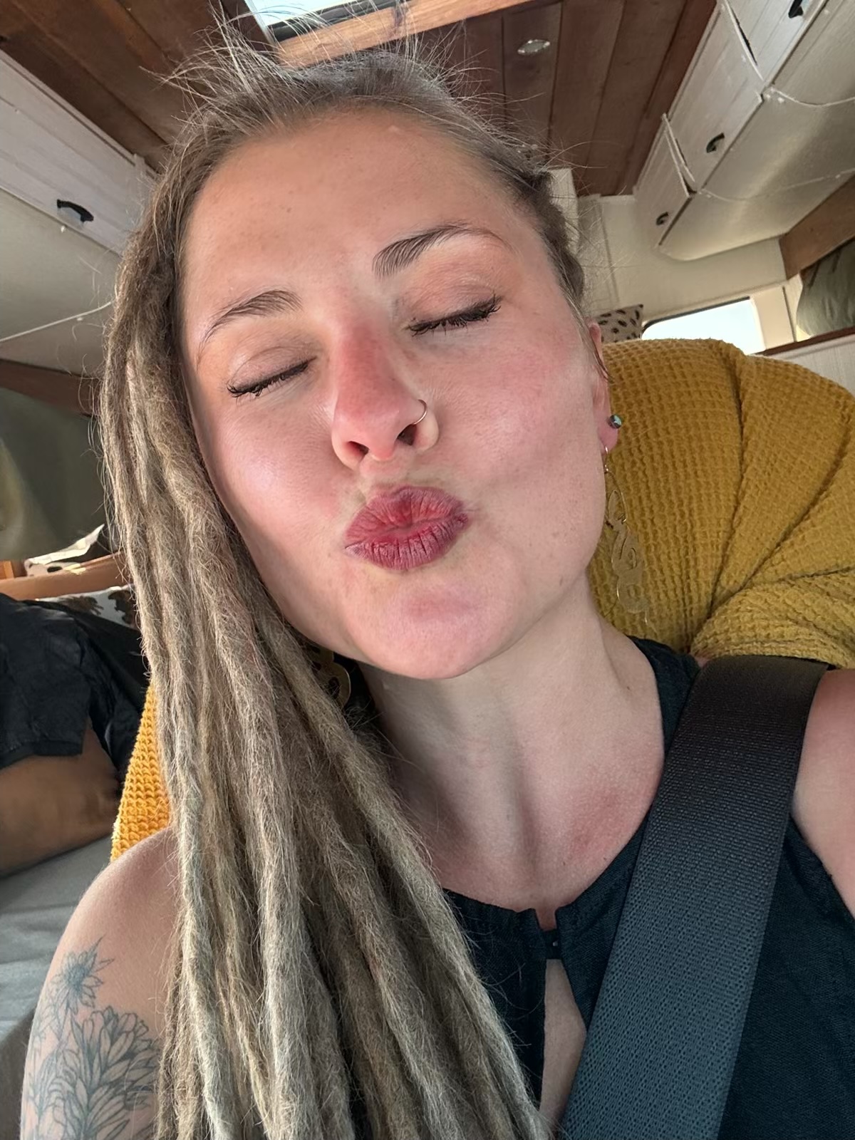 Breeanna Kjerstin Smith, Stephen’s best friend, eyes closed and blowing a kiss toward the camera